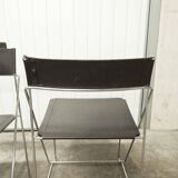 Set of 3 minimalist X line chairs by Niels Jorgen Haugesen.