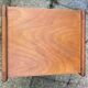 Wooden bedside table, warm tones, vintage, 1950s.