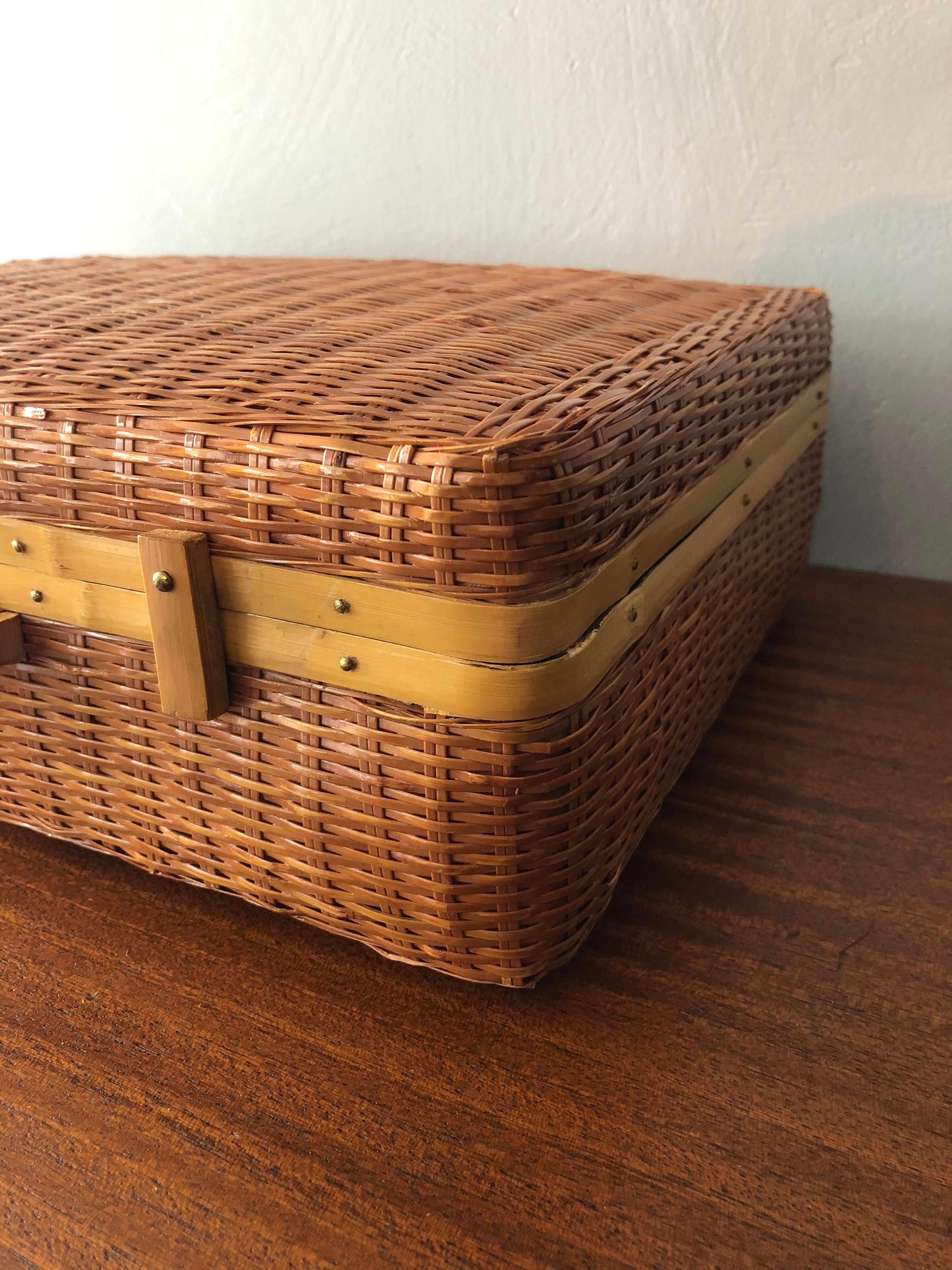 Vintage braided wicker suitcase