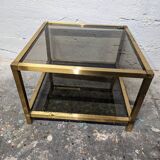 Table basse en métal doré et verre fumé