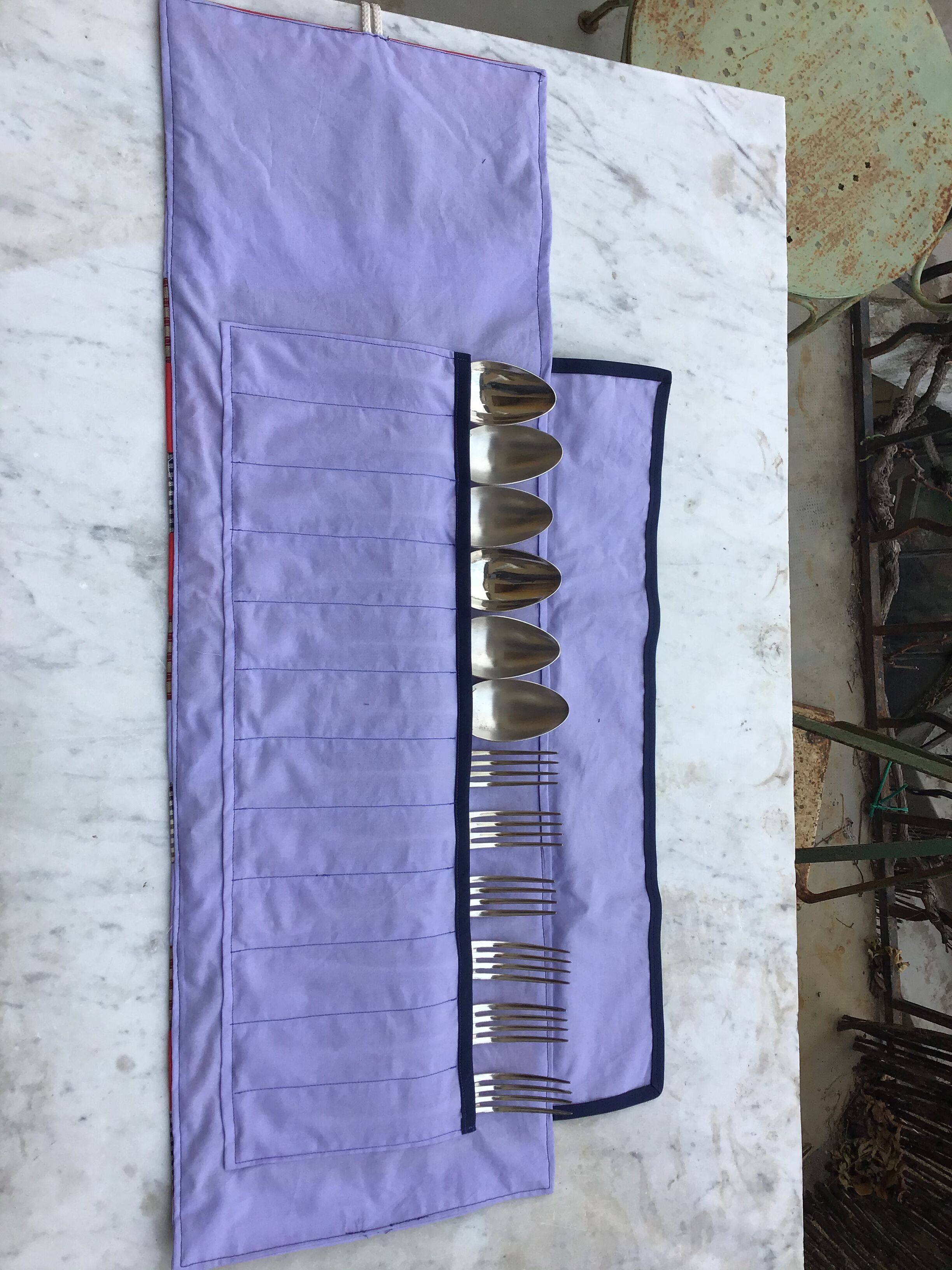 Silver metal covers in their pouch