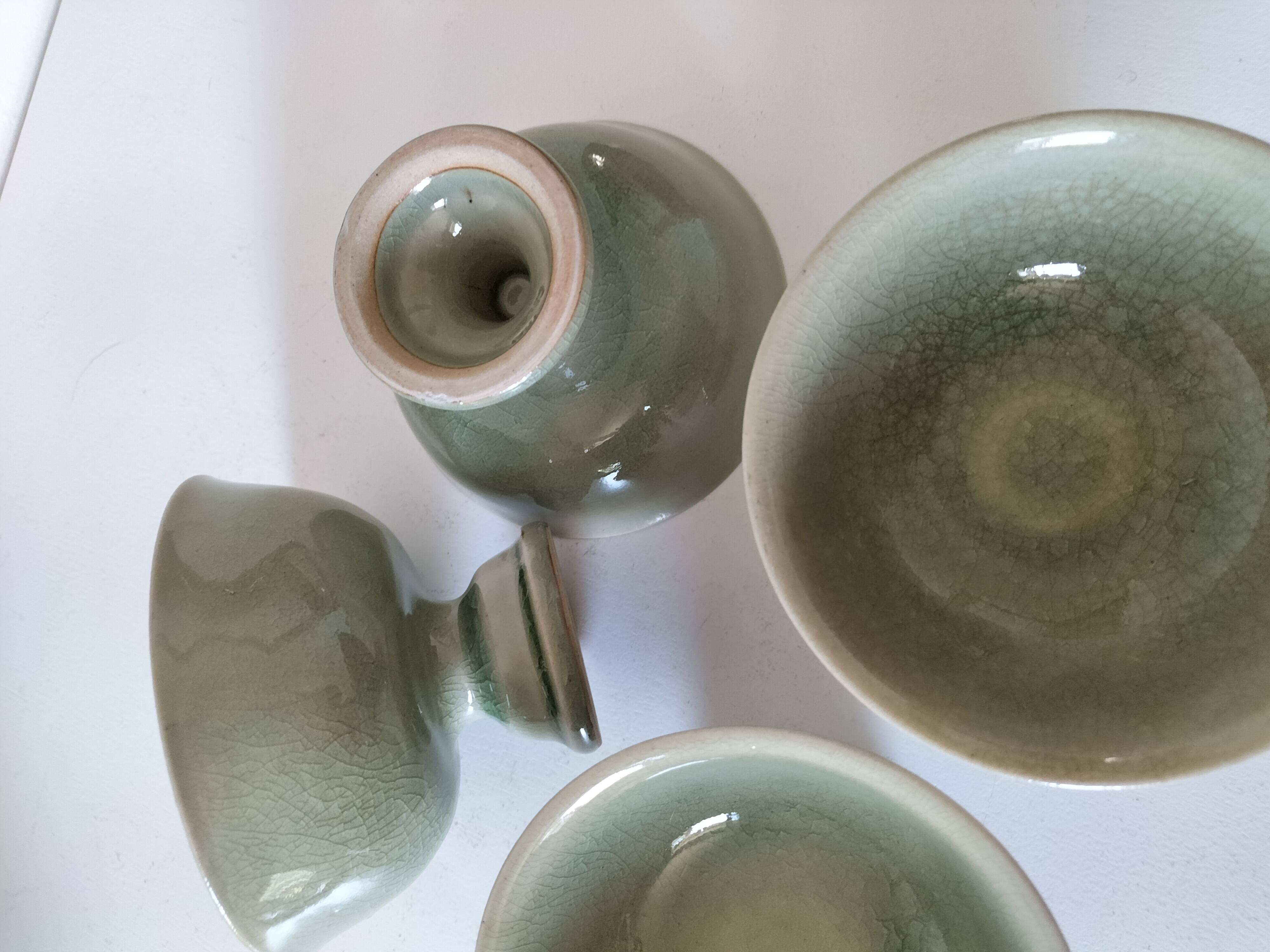Set of 4 handmade ceramic bowls – celadon glaze & raku style