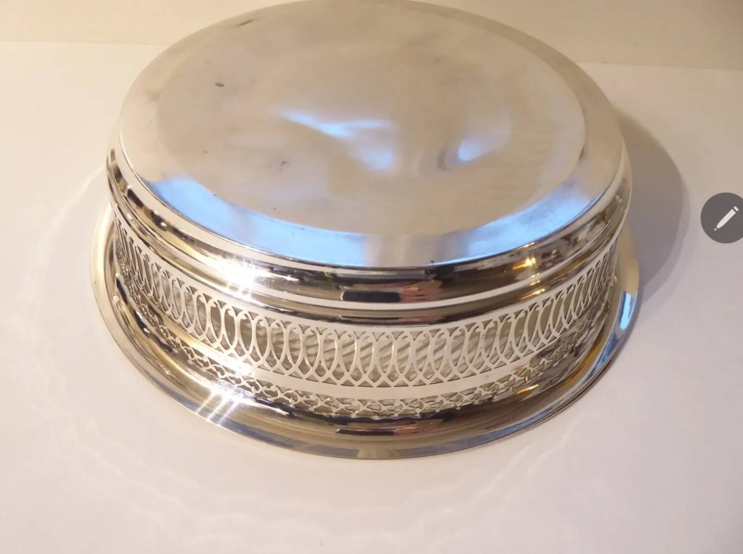 Large openwork basket in silver metal