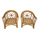 Two large rattan armchairs