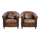 Set of two sheepskin club armchairs with fixed seat cushions
