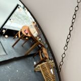 Oval beveled mirror with its chain