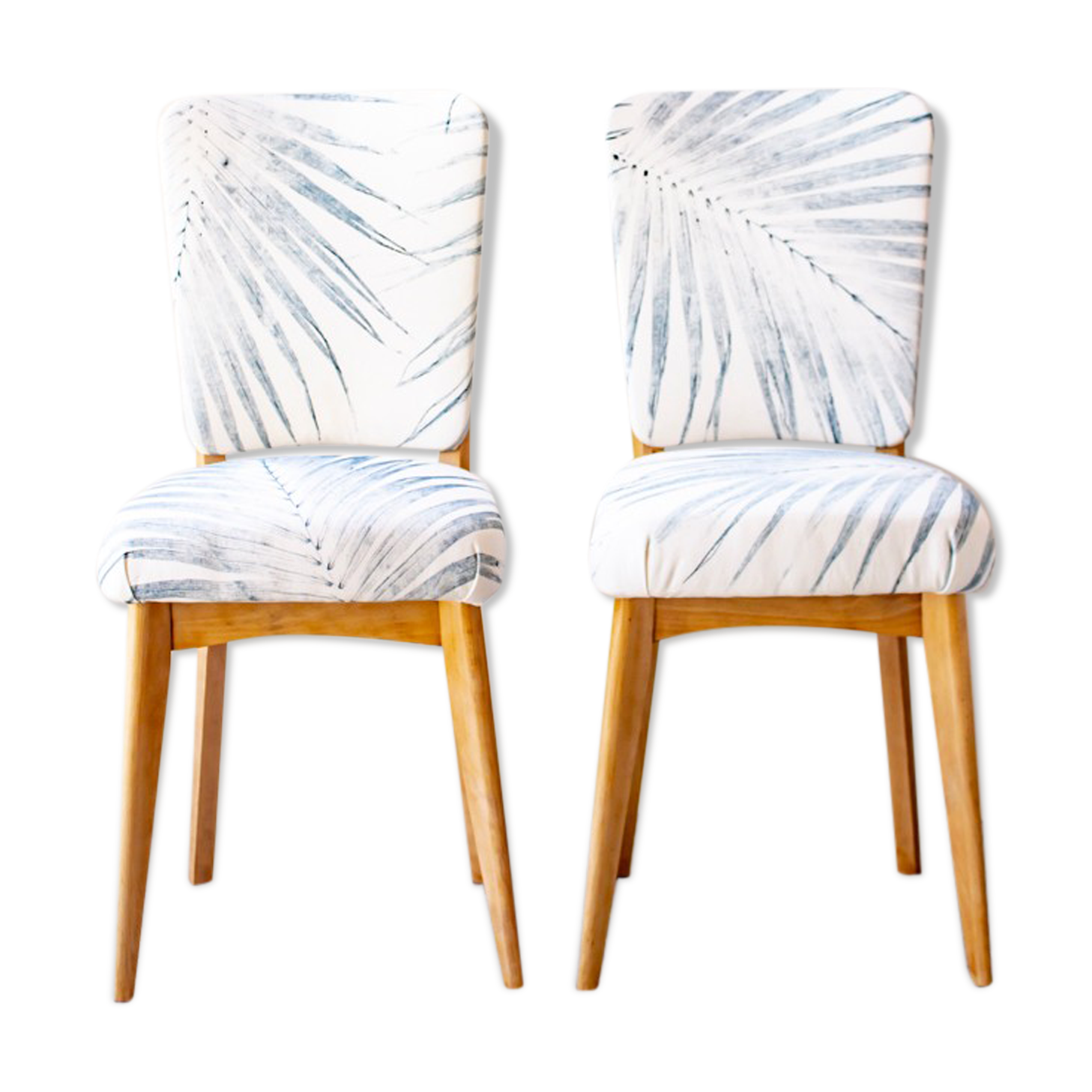 Pair of vintage chairs reupholstered with palm pattern fabric