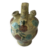 Mediterranean ceramic jug with floral decoration.