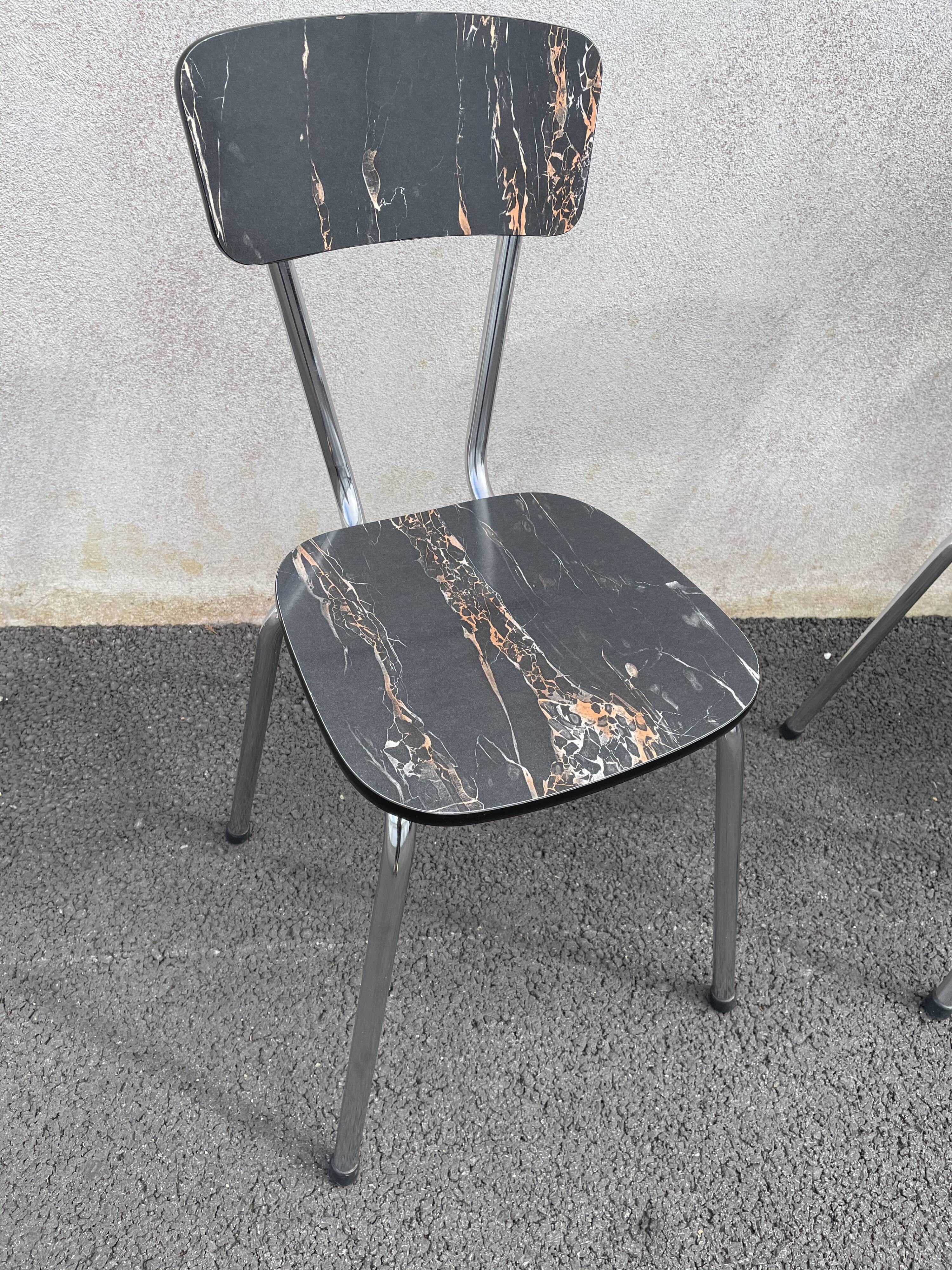 Black marbled formica chairs