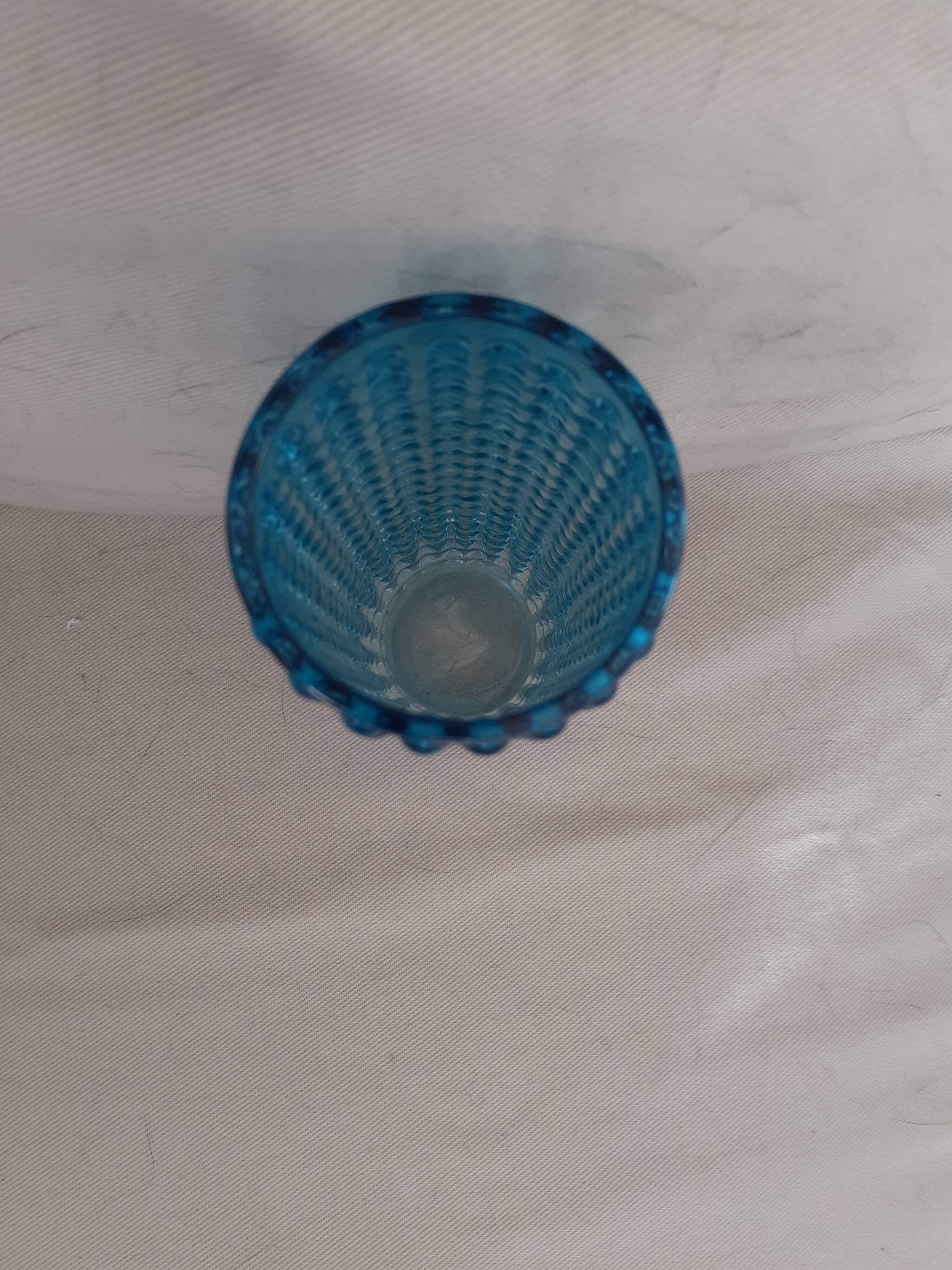 Vintage glass vase with bubble decoration.