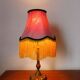 Art Nouveau lamp with fringed fabric shade