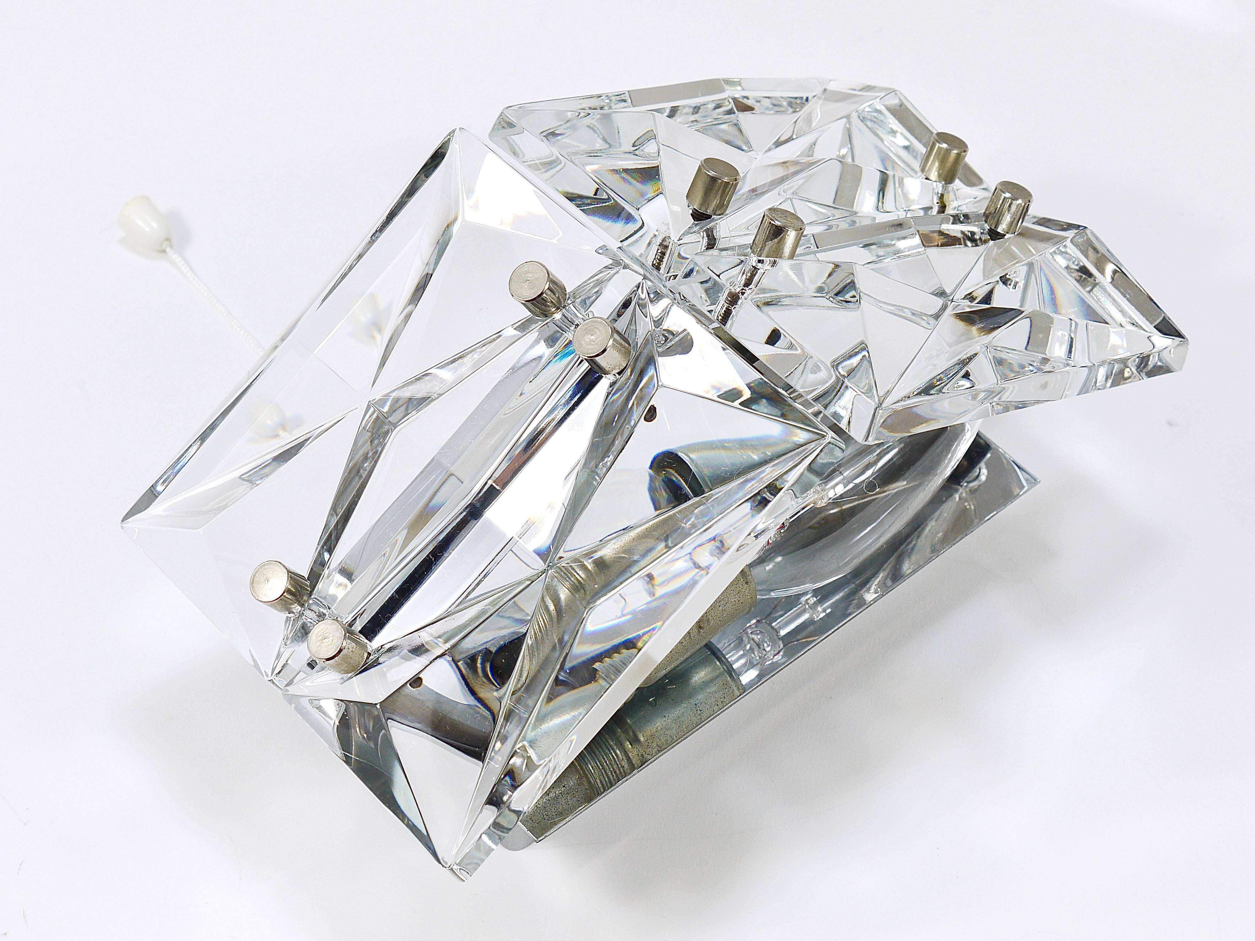 Pair of wall sconces in faceted crystal and chrome / prism glass wall lamps by Kinkeldey