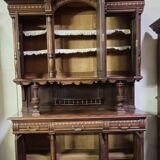 Important two-body buffet in solid walnut, richly carved in pure Renaissance style.
