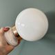 Vintage globe wall or ceiling light in white opaline.