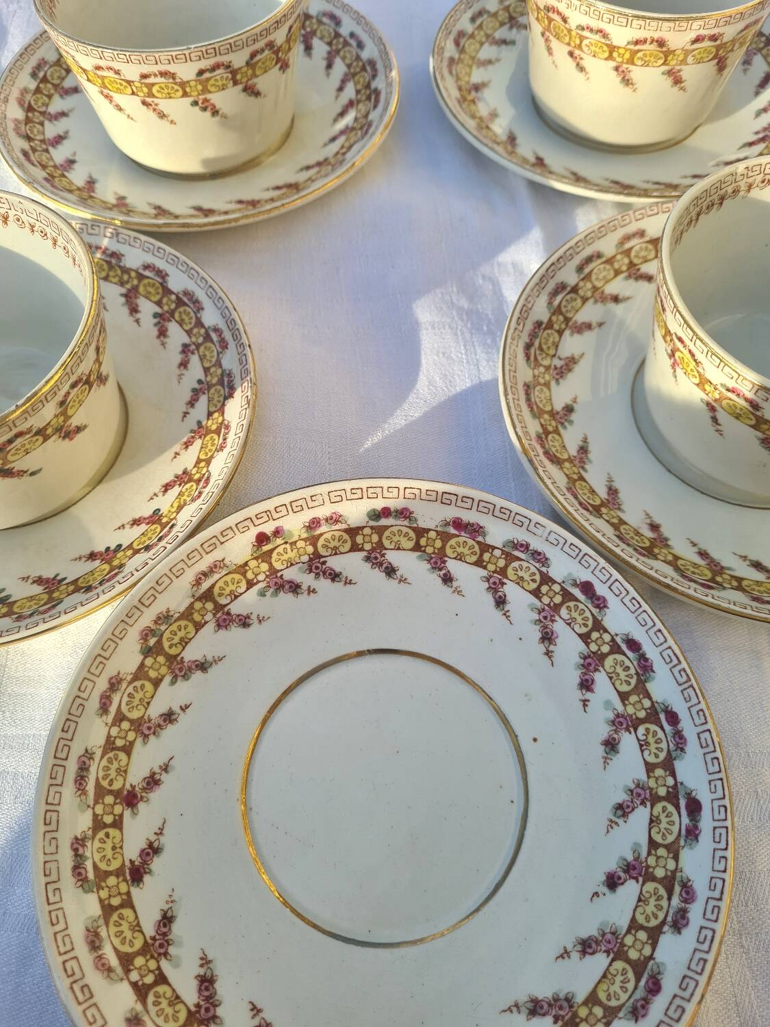 Gien opaque porcelain cups from the early 20th century
