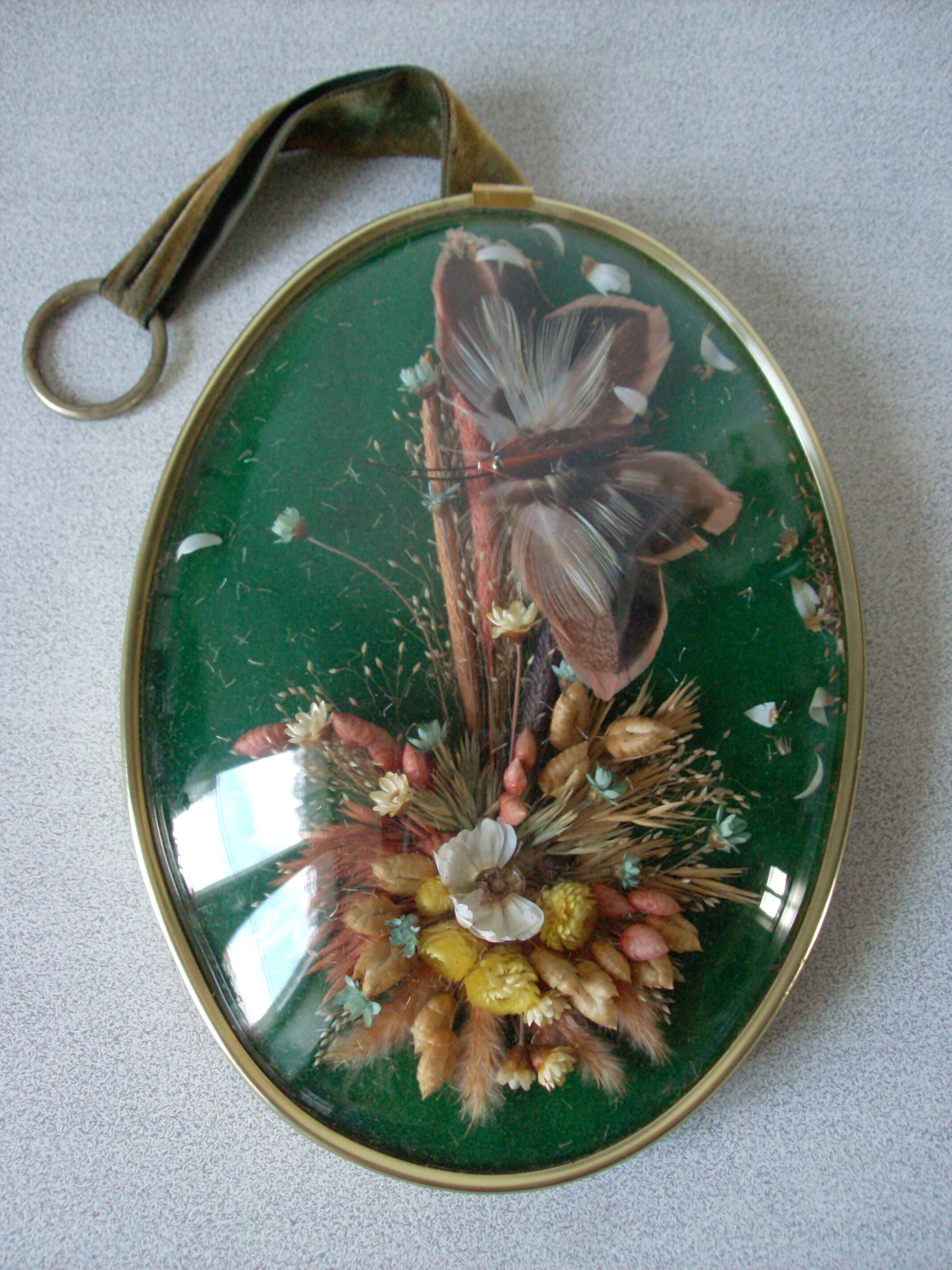 Frame medallion bouquet of dried natural flowers butterfly feather domed glass
