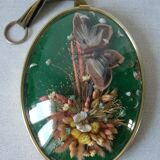 Frame medallion bouquet of dried natural flowers butterfly feather domed glass