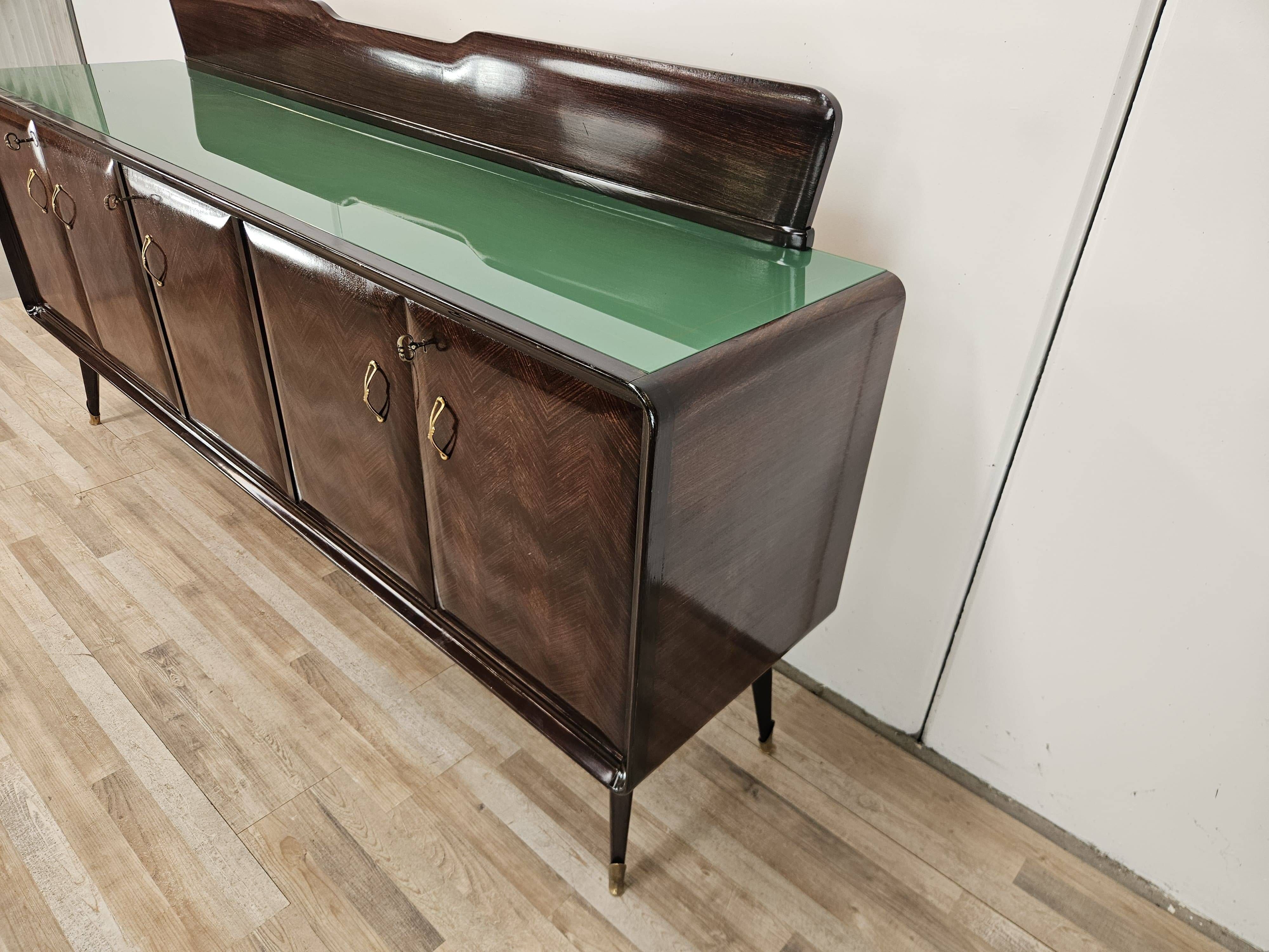 Mahogany sideboard with a glass top, 1960
