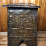 Old stool with vintage carved wood chest
