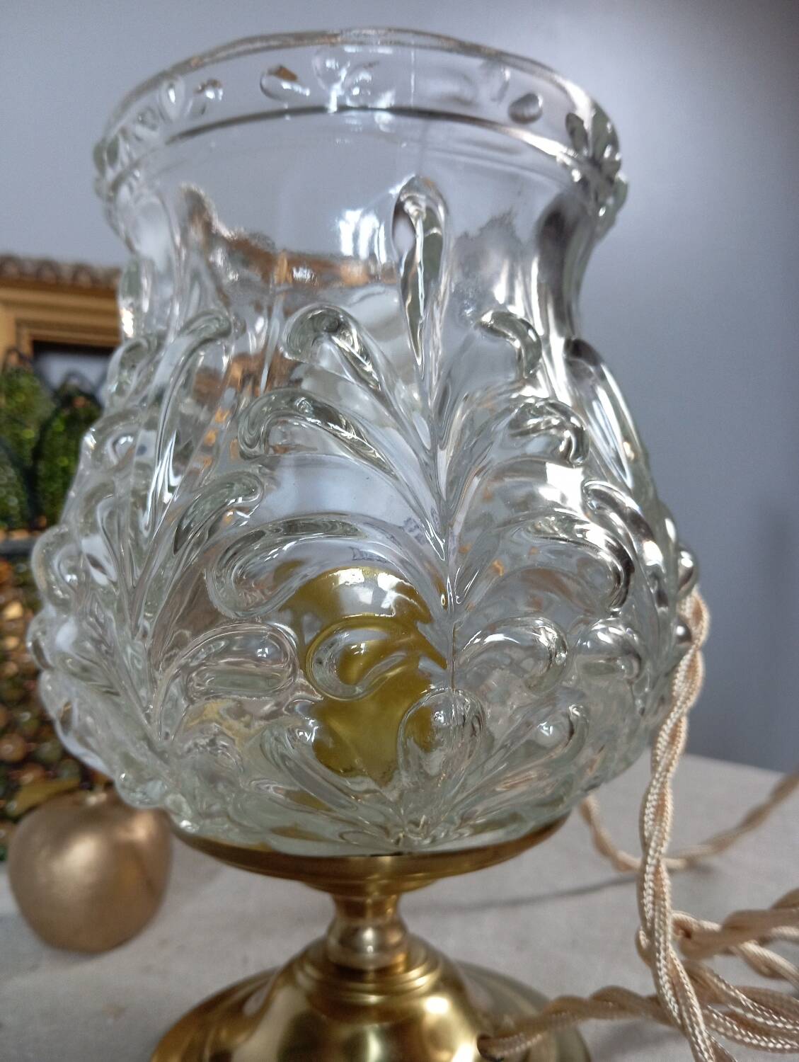 Brass foot table lamp, transparent textured molded globe, art deco style
