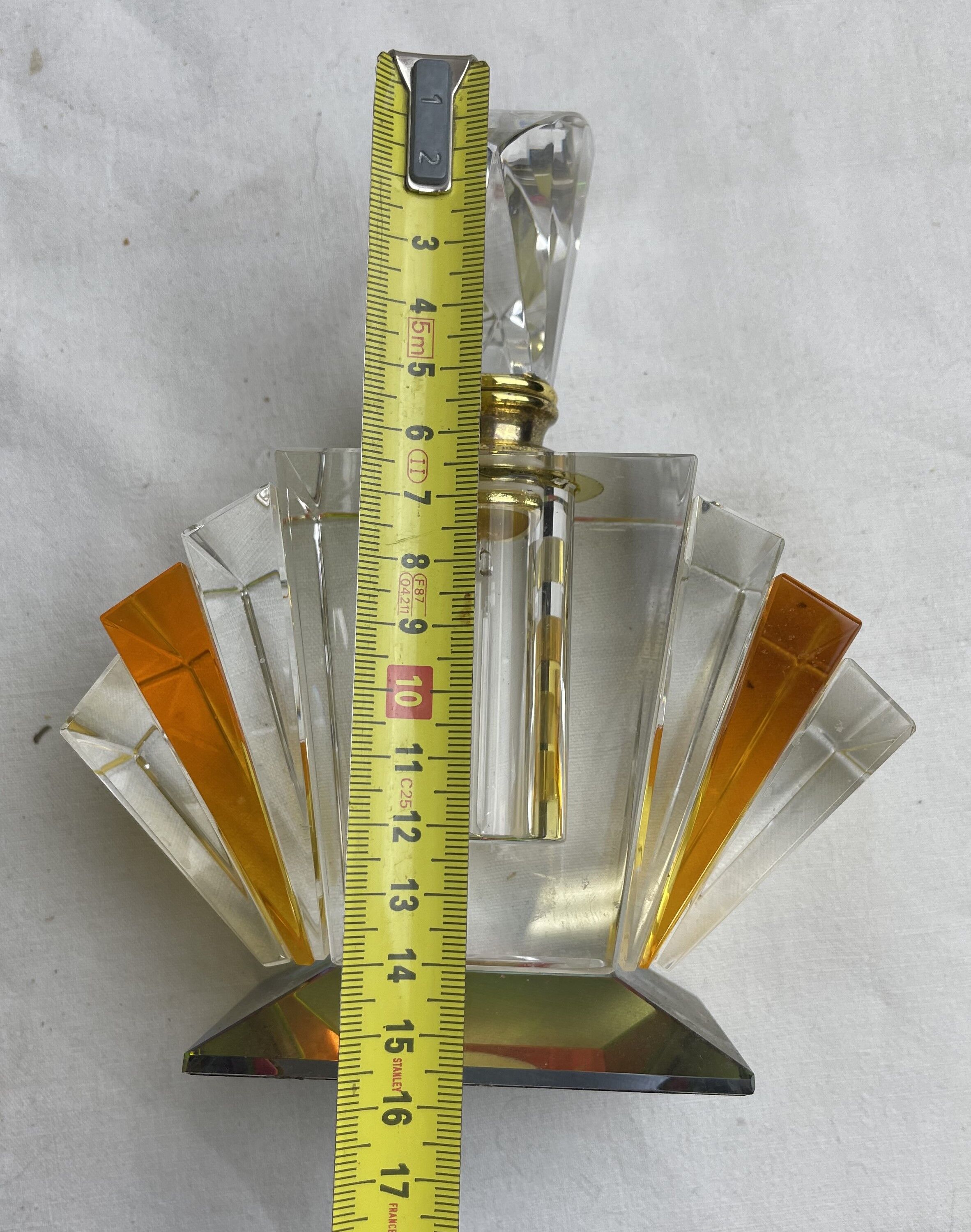 Empty art deco perfume bottle in amber crystal