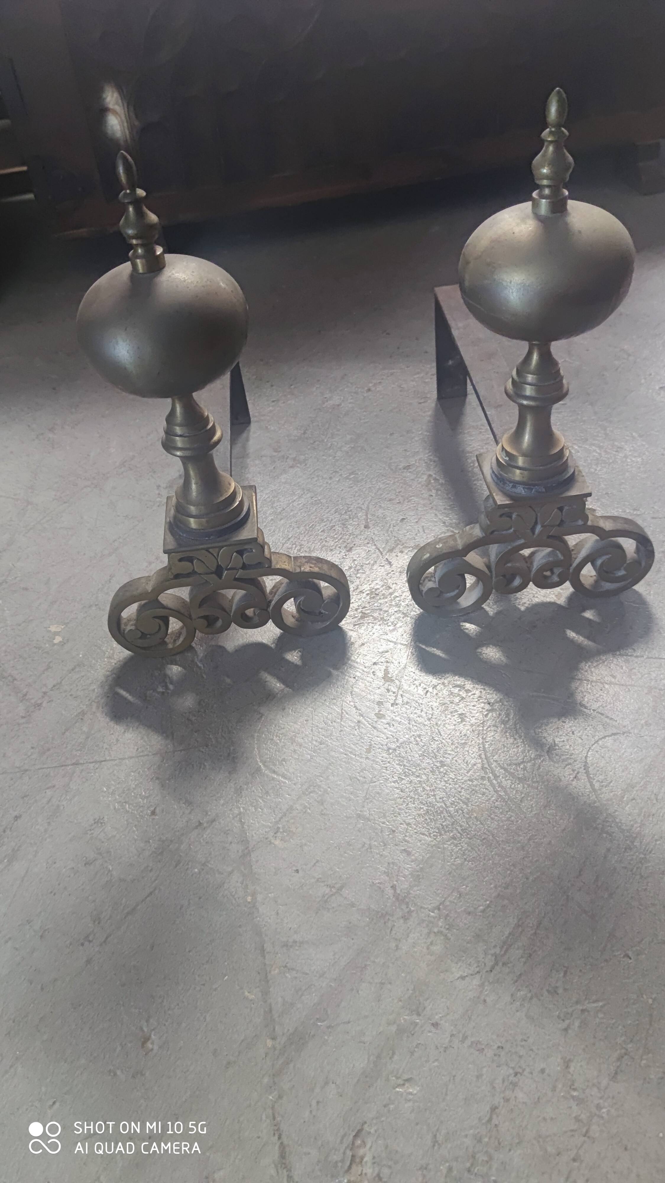 Pair of bronze and steel andirons, 19th century, Holland