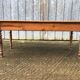 Antique farmhouse table in solid cherry wood in Louis Philippe style.