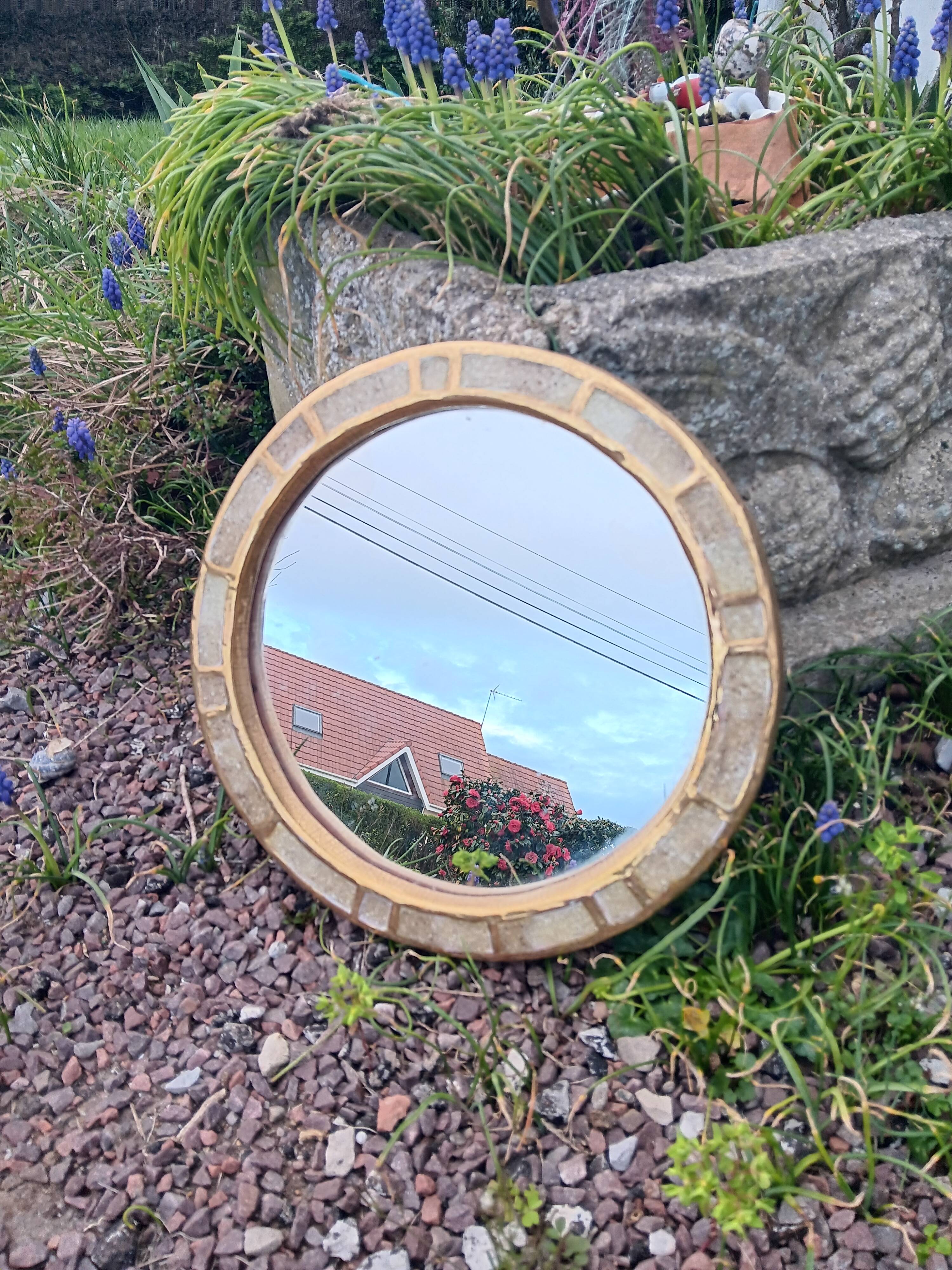 Ceramic mirror "gears" by Mithé Espelt