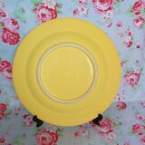 Plat rond ancien en faïence jaune