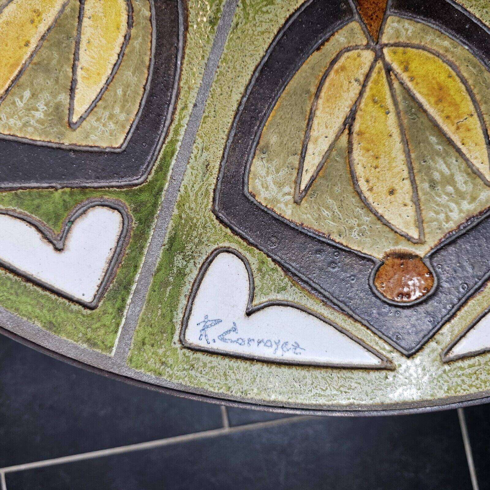 Round living room table from the 60s signed r.corroyez
