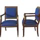 Pair of Empire style armchairs in mahogany and gilt bronze.