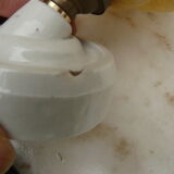 art deco wall light in porcelain and yellow glass