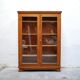 Armoire bibliothèque vitrée vintage en bois
