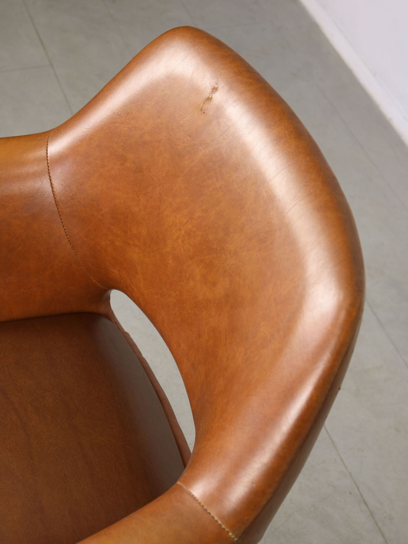 Mid-century brown leatherette swivel chair from Stol