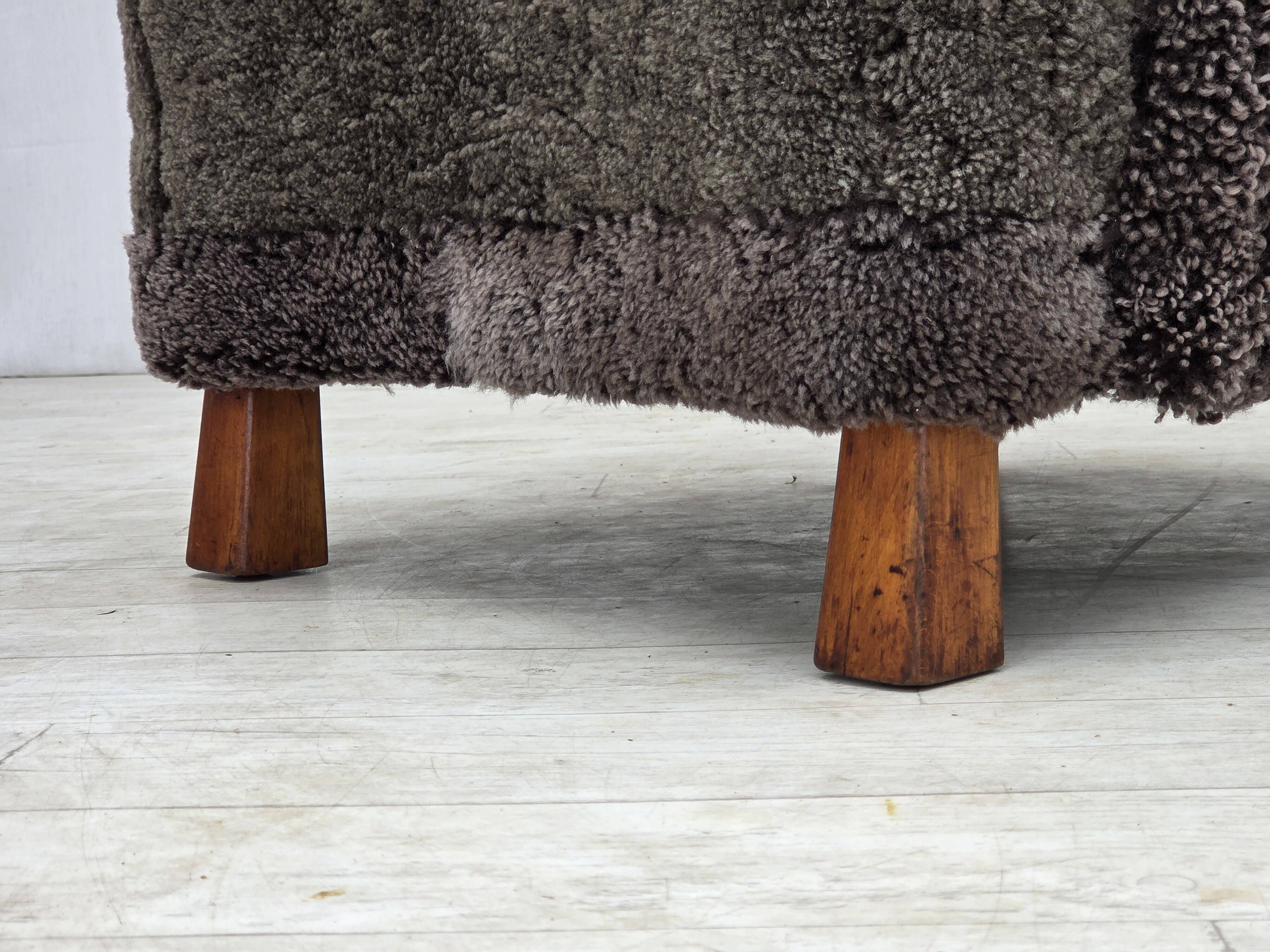 1960s, Danish design, reupholstered armchair, genuine sheepskin.