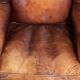 Comfortable cowhide wingback armchair in English style