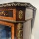 Napoleon III display cabinet in rosewood veneer and marquetry, 19th century.