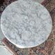 White marble harness pedestal table