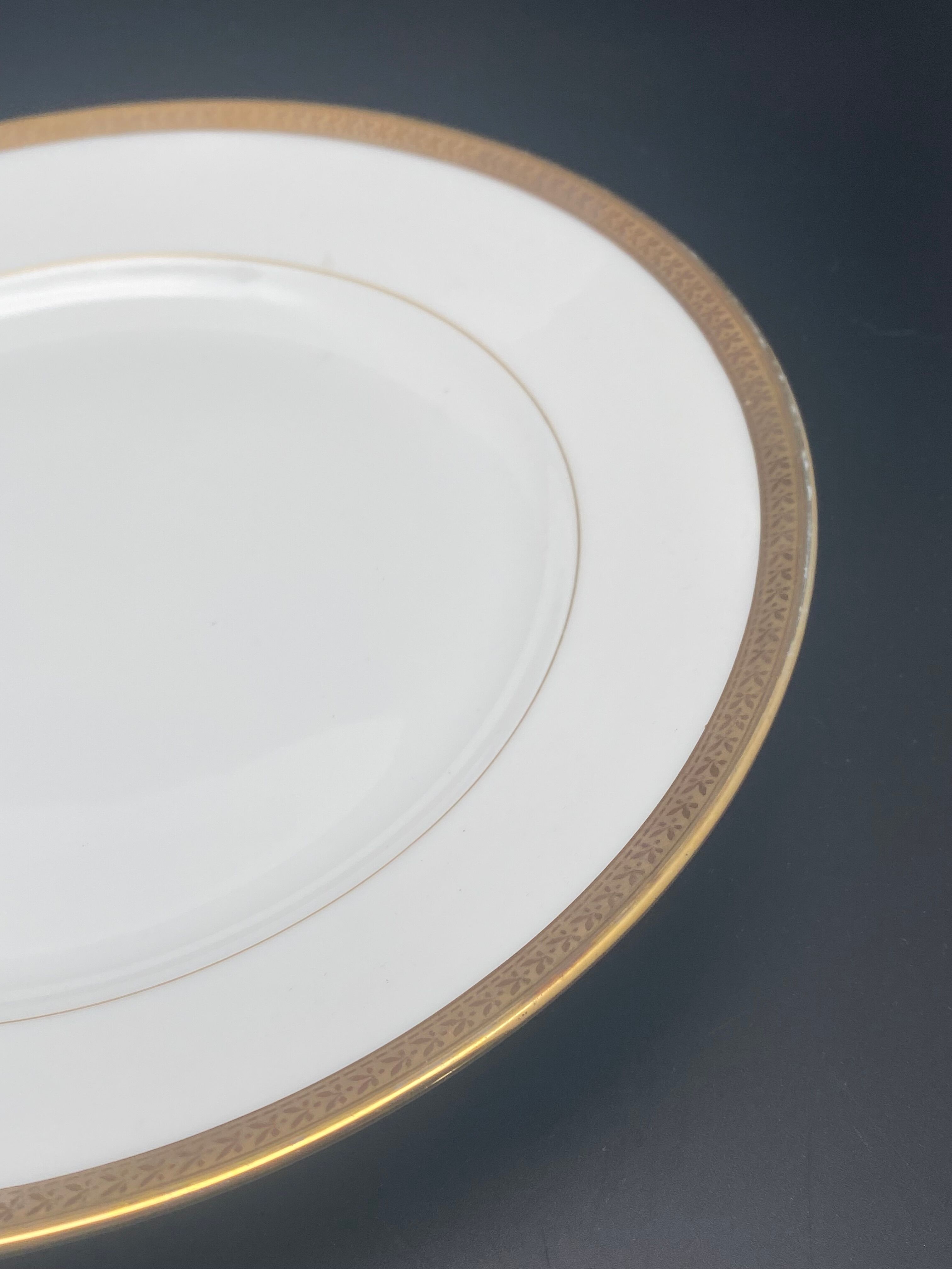 Round porcelain dish from Limoges golden tower