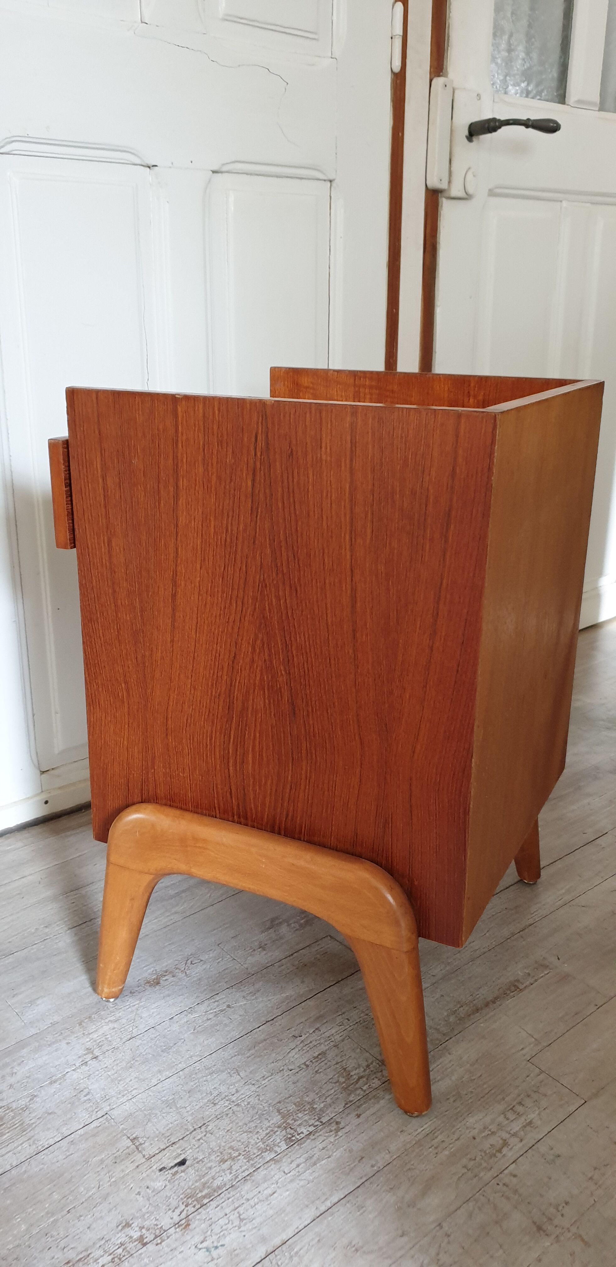 Scandinavian-style compass-footed bedside