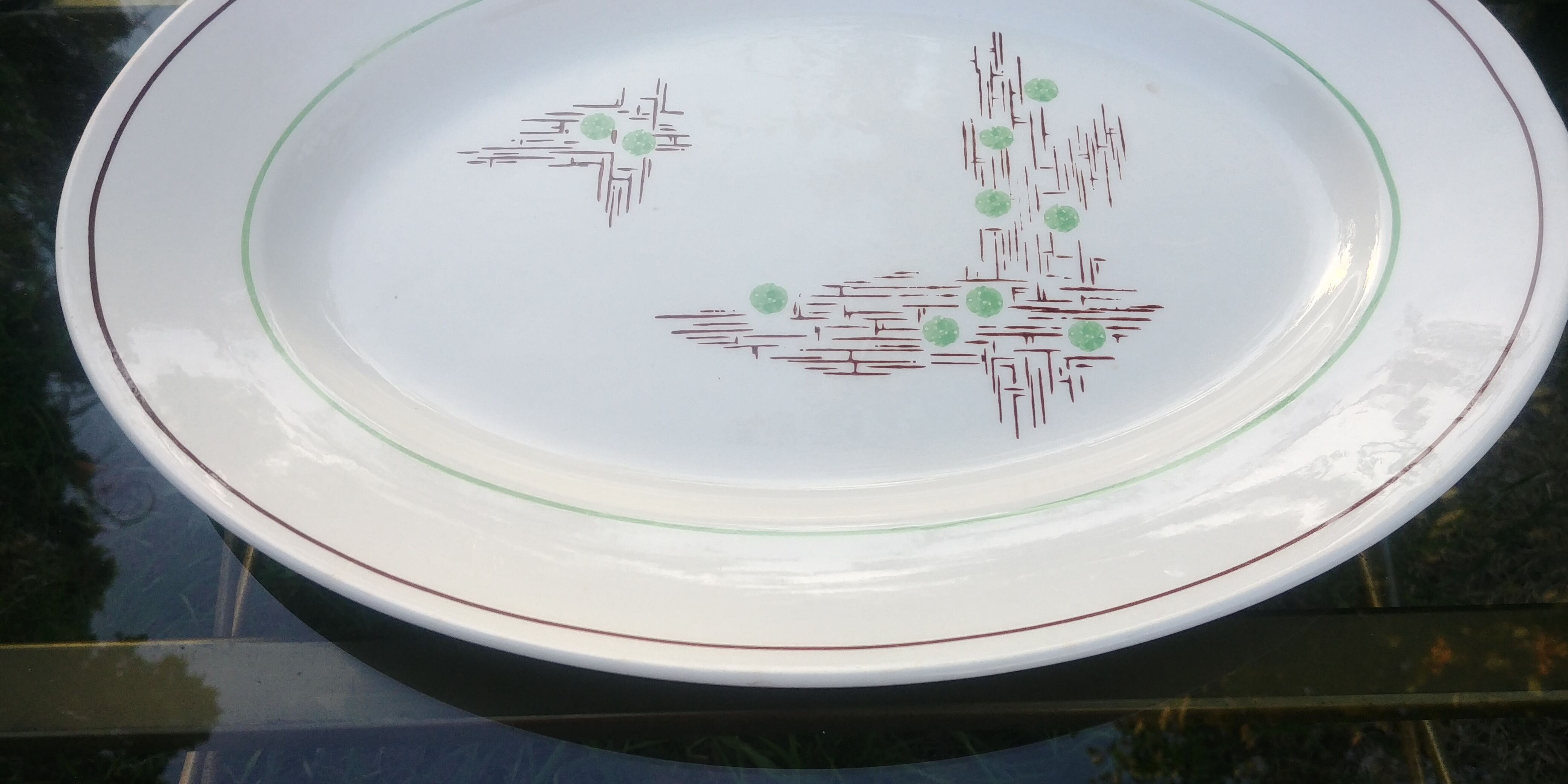 Oval serving dish of the faience factory of Gien model Old Pigalle