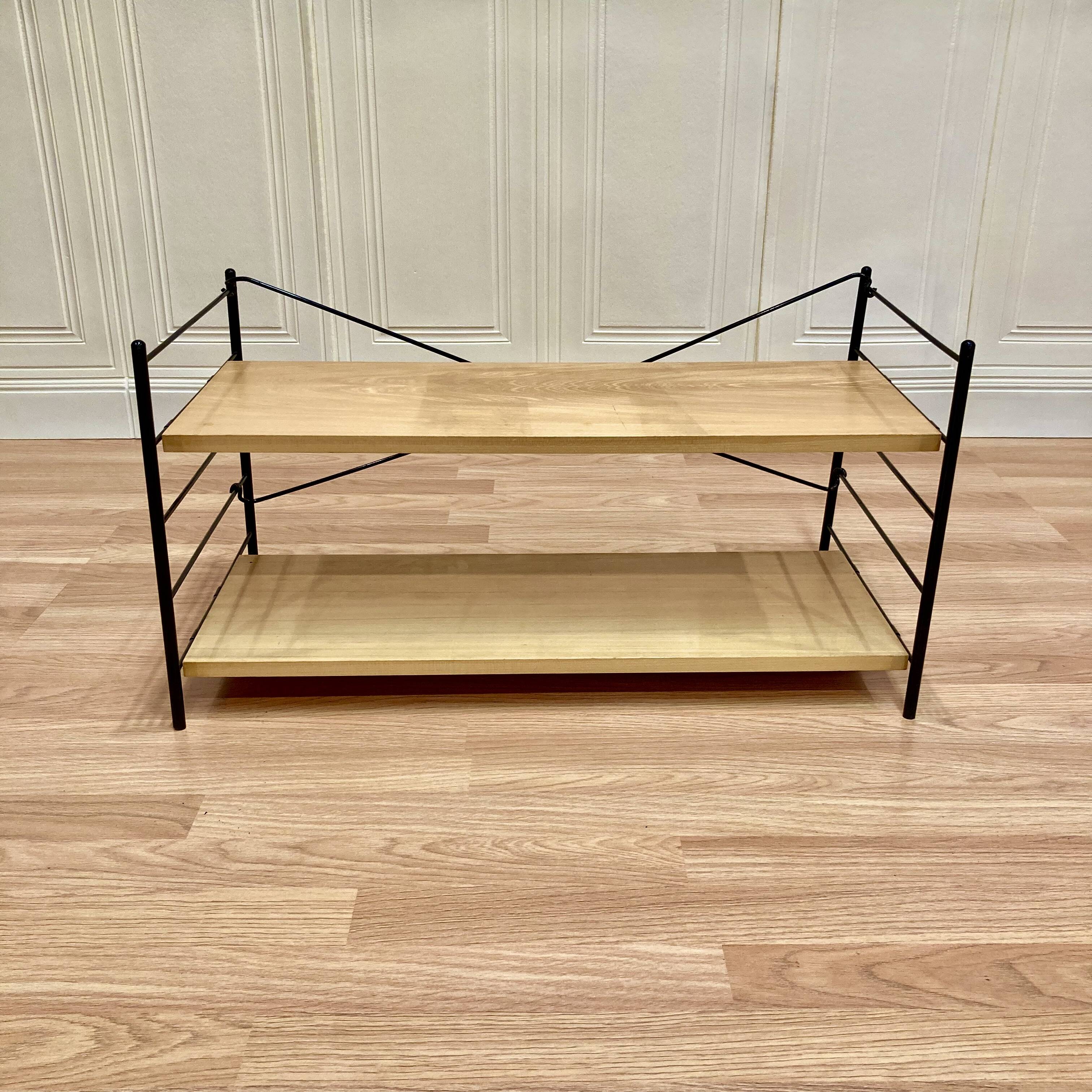 Modular metal and wood shelf design from the 1960s.