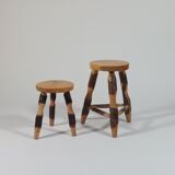 Pair of walnut stools sculpted in a vintage mid-century cross-section.