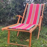 Vintage deck chair in wood and striped fabric - mid-20th century