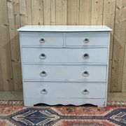 English chest of drawers painted in fir with glass knobs, 19th century