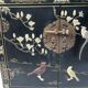 Chinese sideboard with gold lacquer and mother-of-pearl inlay. Bird and landscape decor.