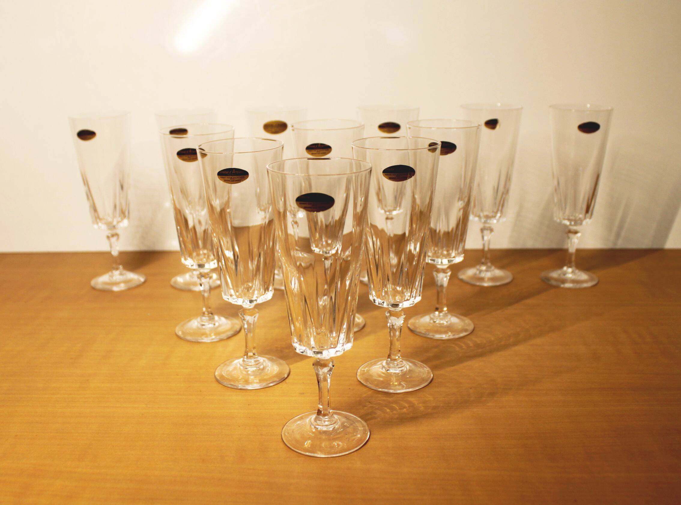 Set of 12 champagne flutes, “Versailles” model, Cristal d'Arques, 70's.