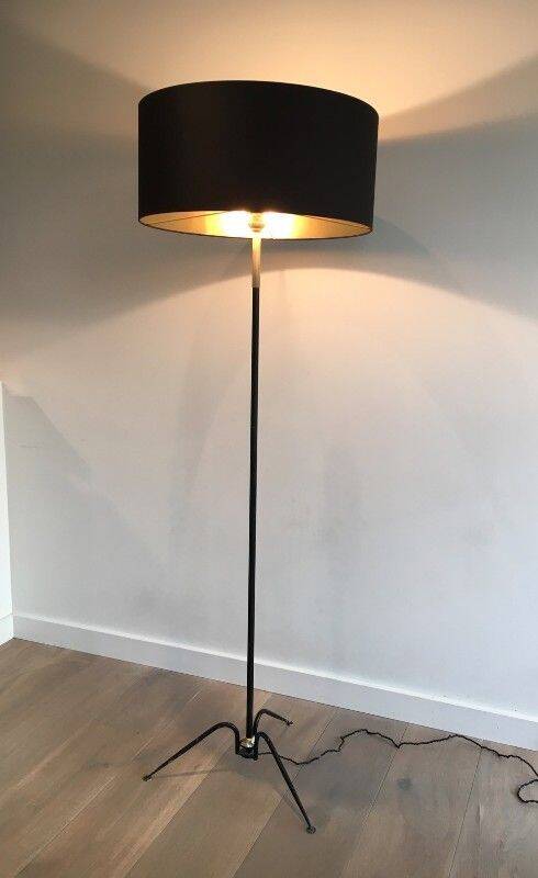 Floor lamp in black lacquered metal and brass