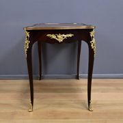 Rosewood, mahogany, and rosewood desk-table, Louis XV style – early 20th century.