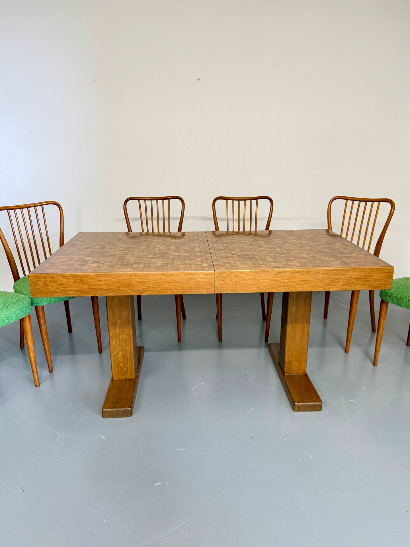 Wooden marquetry dining table designed by Dieter Waeckerlin from the 1960s.